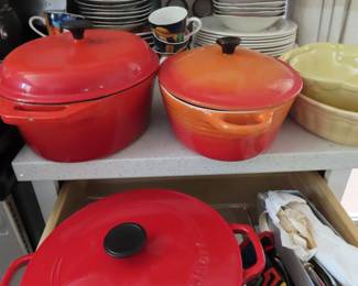 Cast iron and enamel dutch ovens,