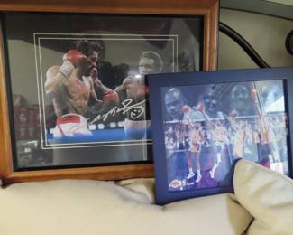 Signed boxing and lakers photos.
