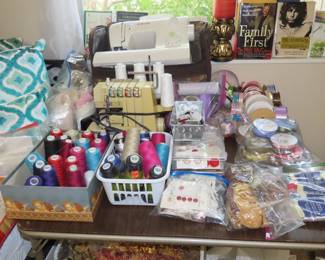Sewing machines, fabrics, notions, threads, buttons.