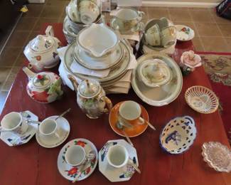 Bone china tea cups, tea pots and dinner set.