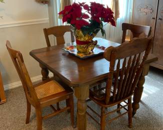 Antique table w/ mismatched chairs. 