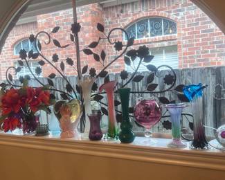 A large collection of colored glass vases !