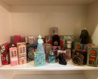 A large collection of AVON perfume bottles 
