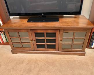 $200 - 3 door media center - 26" H, 61" W, 21" D