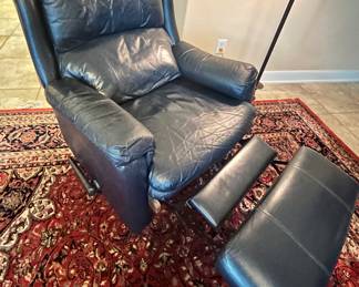 La-Z-Boy recliner in navy blue leather. It's used but still in great condition. We're selling 2