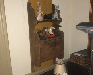 Wall shelf with drop down secretary door