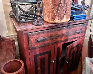 Painted chest, Carved wood umbrella stand, Drum made out of a log.