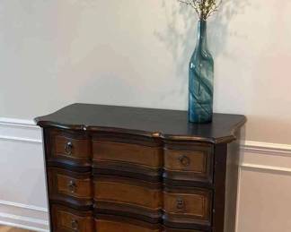 Dresser, Vase, And Wall Hanging