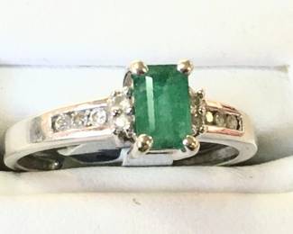 Emerald and diamond white gold ring