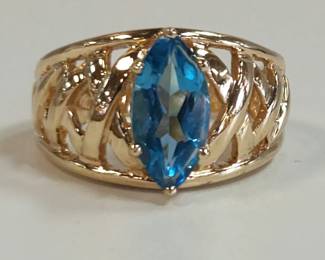 Swiss blue topaz yellow gold ring