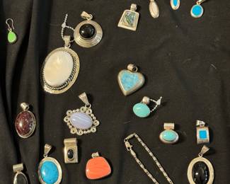 Collection of sterling and inlaid gems pendant - coral, turquoise, onyxm, lavender jaqde, we have it all!