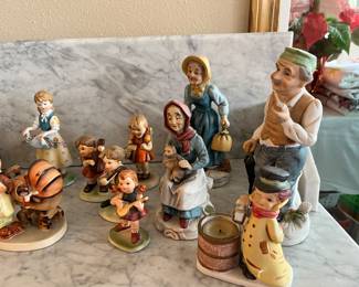 Variety of porcelain figurines 