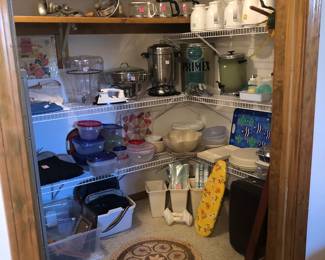 various kitchen appliances and storage containers - downstairs
