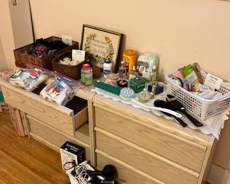 Two matching 3 drawer dressers, hair care products and more.