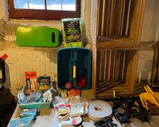 Miscellaneous hardware, weatherstripping, extension cords, garden caddy and micro wipes.