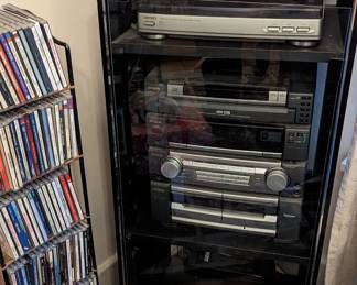 AIWA 4 piece stereo system and display case.