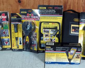 General Tools Including Digital Multimeter, Model DMM20UL, Ratchet Tubing Cutter, Moisture Meter, Rescue One Flashlight, Plastic Pipe And Hose Cutter, Clamp Halves, And More