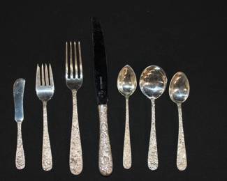84 Piece Estate Set Kirk & Sons Sterling Repousse pc.12 place setting monogrammed Flatware, 12pc - 7.75" dinner forks 1,039 grams, 12pc - 6.25" salad forks 560 grams, 12pc - 6.25" Soup Spoons 593 grams, 12pc - 5 7/8" small spoons 484 grams, 12pc - 6 1/8" grapefruit spoons (including bags) 404 grams, 12pc Butter Knives 336 grams, 12pc - 9.75" Knives (sterling handle w/ stainless steel blade) 1055 grams....Total grams NOT including the 12-9.75" knives w/ stainless steel blade.....3,416