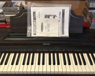 Suzuki keyboard with bench