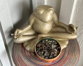 Plants, pots, patio furniture and yard art. 