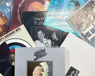 (7PC) BILLIE HOLIDAY VINYL RECORDS | Vinyl record albums by Billie Holiday including; Lady in Satin (PC 8048), A Day In The Life Of Billie Holiday (DD 1003), Billie's Blues (BDL 1007), Lady Day (CL 637), Billie Holiday's Greatest Hits (CL 2666), The Legendary Masters Unissued or Rare Box Set, and Giants of Jazz Billie Holiday Box Set.