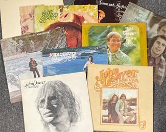 (9PC) JOHN DENVER & SIMON & GARFUNKEL | Vinyl record albums, including six John Denver albums: I Want to Live (AFL1-2521), Back Home Again (CPL1-0548), Windsong (APL1-1183), Rocky Mountain High (LSP 4731), Rhymes & Reasons (LSP 4207), Greatest Hits (CPL1-0374); plus Simon and Garfunkel Bridge Over Troubled Water (KCS 9914); Parsley, Sage, Rosemary, and Thyme CS 9363); and Paul Simon, Still Crazy After All These Years (PC33540)