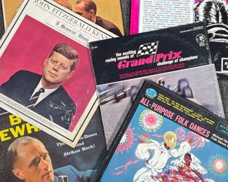 (6PC) MISC. RECORDS LOT | Including; John Fitzgerald Kennedy A Memorial Album (2099), Behind the Button-Down Mind of Bob Newhart (W 1417), Bob Newhart The Button-Down Mind Strikes Back! (W 1393), The Exciting Sounds Racing Sounds of Grand Prix Challenge of Champions (SE-4457), All-Purpose Folk Dances (LPM-1623), and The First Authentic 1950's Rock & Roll Collection (95717)
