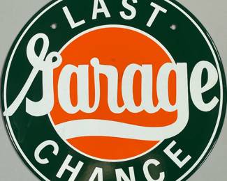 20TH CENTURY “LAST CHANCE GARAGE” SIGN | Circular sheet metal sign painted “Last Chance Garage”. - dia. 11.75 in

