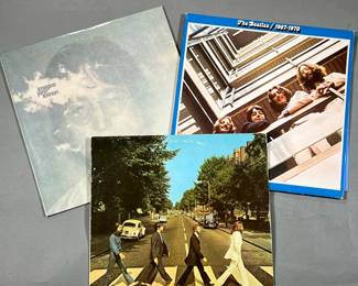 (3PC) BEATLES VINYL | Three vinyl records including Abbey Road by the Beatles (SO-383), 1967-1970 (The Blue Album) by the Beatles (SKBO 3404), and Imagine by John Lennon (SW 3379)
