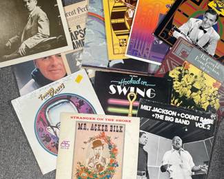 (12PC) BENNY GOODMAN, ETC. | Vinyl record albums, including: Gershwin Rhapsody in Blue; Andre Kostelanetz; Hooked on Swing; Tommy Dorsey and his Orchestra; the Music of Cole Porter; Milt Jackson + Count Basie; and Mr. Acker Bilk; plus The Complete Benny Goodman Vol. II 1935-1936, Vol. III 1936, Vol. IV 1936-1937, Vol. V 1937-1938, Vol. VII 1938-1939