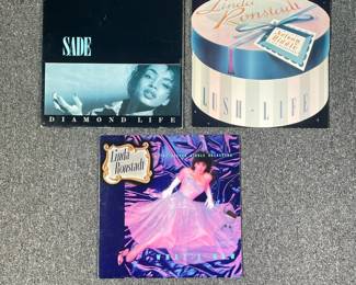 (6PC) 80S VINYL RECORDS | Including; Sade Diamond Life (BFR 39581), Linda Ronstadt Lush Life (60387-1), Linda Ronstadt What's New (60260), Janis Joplin Pearl (KC 30322), Diana Ross Live at Caesars Palace (M6-801S1), and Saturday Night Fever The Original Movie Soundtrack (RS-2-4001)
