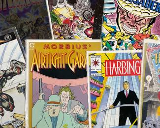 (7PC) MISC. COMIC BOOKS | Including; Omen, Archie Adventure Series No. 11, Grip, Chaos! Comics Detonator, Moebius' Airtight Garage #2 of 4, Valiant Comics No. 15 Harbinger, and Clive Barker's Hell Raiser Dark Holiday Special.

