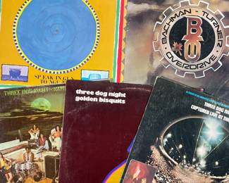 (5PC) THREE DOG NIGHT & OTHER VINYL RECORDS | Including; Three Dog Night Naturally (DSX 50088), Three Dog Night Golden Bisquits (DSX 50098), Three Dog Night Captured Live at The Forum (DS 50068), Talking Heads Speaking in Tongues (23883-1), and Bachman-Turner Overdrive Head On (SRM-1-1067)
