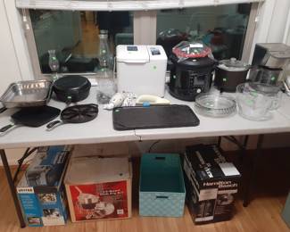 Counter Top kitchen Appliances, Cast Iron Skillets, Griddle and Pot.