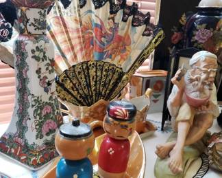 These wooden figures are awesome, the female has smaller figures inside