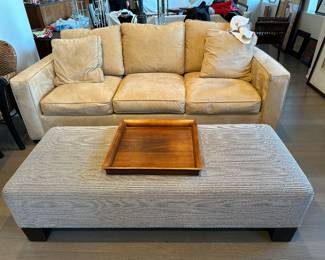 Crate and Barrell sleeper couch. Custom ottoman. 