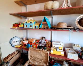 Old fisher price . We have many dolls , doll houses and doll clothing throughout the house 