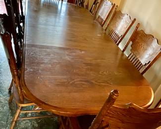 Very Nice Kitchen / Dinning Double Pedestal ClawfootTable with 8 Chairs 60" long without leaves x 30" Tall.  Leaves add 18" each -there are 2 makes it 8' total. Pressback Chairs are strong w no issues Two are captain.   Available for Presale!
