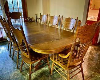 Very Nice Kitchen / Dinning Double Pedestal ClawfootTable with 8 Chairs 60" long without leaves x 30" Tall.  Leaves add 18" each -there are 2 makes it 8' total. Pressback Chairs are strong w no issues Two are captain.   Available for Presale!