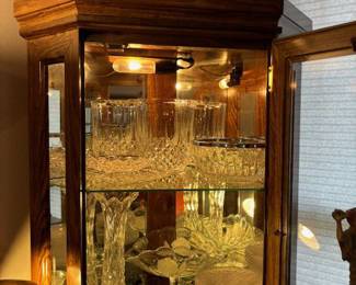 Very nice cabinet, well lit and full of beautiful things.