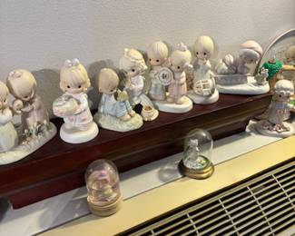 Here are a few Precious Moments.  There are also some Precious Moments Christmas ornaments.