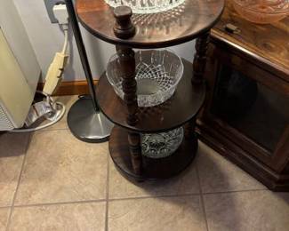Cute little side table.