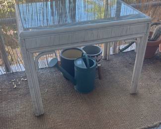 Watering can, planters, outdoor deck rattan/glass table 