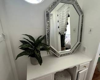 Walk in closet accessories including a huge amount of hangers, vintage clothes, mirrors