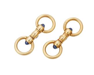 10
A Pair Of Sapphire And Gold Cufflinks, Cartier
The double-sided cufflinks feature cabochon-cut sapphire terminals, in 14K gold, signed Cartier and numbered.
2 pieces
13.50 grams
1 3/8" L x 1/2" W
Estimate: $600 - $800