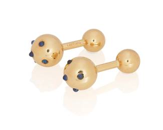 14
A Pair Of Gold And Sapphire Ball Cufflinks, Cartier
The ball cufflinks feature cabochon cut sapphires, in 14K gold, signed Cartier and numbered.
2 pieces
10.4 grams
1 1/4" L
Estimate: $600 - $800