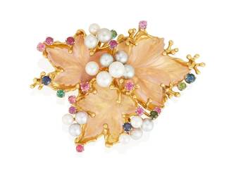 205
A Gold, Rose Quartz And Colored Stone Brooch
Designed as the carved rose quartz leaves with gold branches, accented by grey and white cultured pearls approximately measured 4.83 mm to 6.67 mm, and circular-cut sapphires, weighing approximately, 2.20 carats, set in 18K gold.
51.73 grams
3 3/4" L x 1 7/8" W
Estimate: $2,000 - $3,000