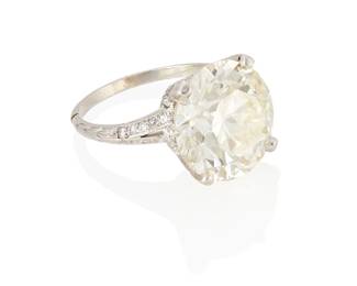 62
A Diamond Ring
Set with a circular brilliant-cut diamond measuring 13.32 x 13.41 x 8.09 mm and weighing 9.06 carats, within a platinum and diamond setting.

Accompanied by GIA report number 6227851208 stating that the diamond is O to P color, VS2 clarity.
6.99 grams
Size: 6.5
Estimate: $50,000 - $75,000