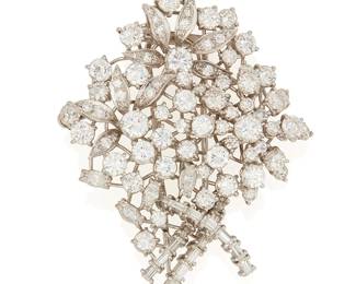 186
A Diamond And Platinum Brooch
Set with 89 round brilliant-cut, baguette-cut, and marquise-shaped diamonds weighing approximately 3.15 carats, mounted in platinum.
22.16 grams
2 1/4" L x 1 1/2" W
Estimate: $3,500 - $4,500