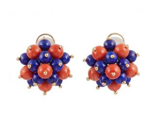 105
A Pair Of Lapis Lazuli, Coral And Gold Earrings
Set with lapis lazuli and coral beads, accented by gold finials, mounted in 18K gold.
25.20 grams<br />3/4" Dia.
Estimate: $2,000 - $3,000
